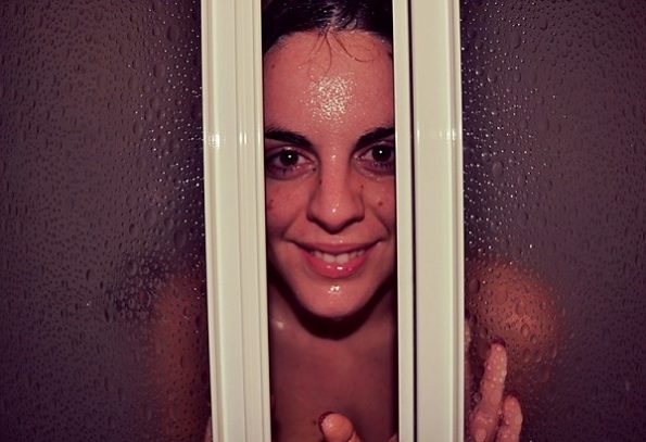why do women take hot showers